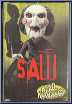Billy the Puppet (Tricycle) from Saw - Head Knockers manufactured by Neca [Back]