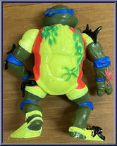 Surfer Leo with Mondo Mutant Surfer Tube from Teenage Mutant Ninja Turtles - Surfin' Ninja manufactured by Playmates [Loose]